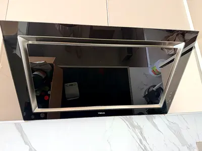Modern Teka Glass Cooker Hood - Black, Wall-Mounted original price 3,800 aed perfect working order