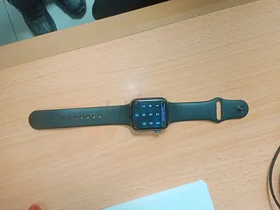 Used Apple Watch Series (black) with silicone band - good condition