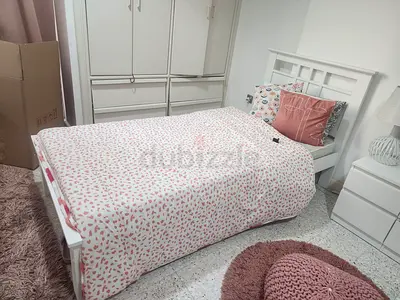 White wooden bed single. Good condition from homes r us.