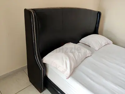 Black Upholstered Bed with Mattress – 180 × 200 cm – AED 1,000