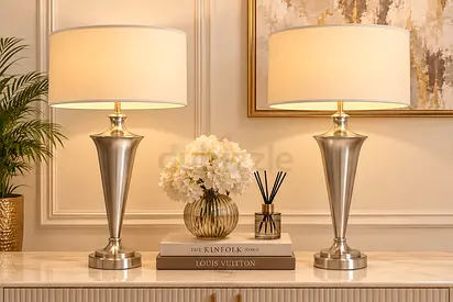 Pair of modern silver table lamps with cream drum shades