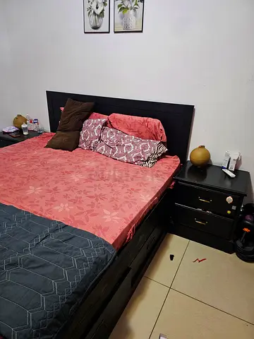 King size Dark wood queen bed frame with headboard and matching nightstand - good condition