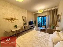 Furnished Studio | SOL Bay | Courtyard & Pool View