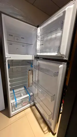 Brand new double-door refrigerator (top freezer) Never used - good condition