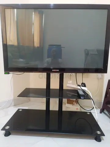 Samsung Flat Screen TV with Glass Stand and Remote