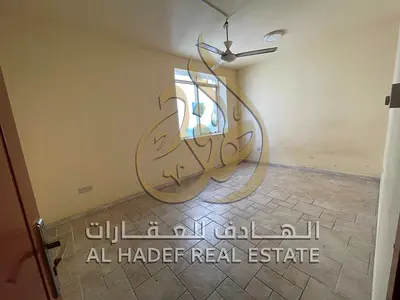 One bedroom and living room for rent in Al Shuwaheen, central air conditioning and gas, prime location, rent 24,000 dirhams per year, payable in 4 or