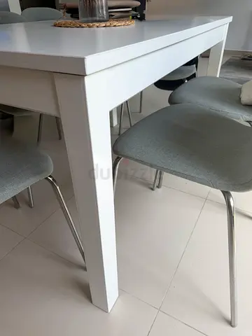 Solid white dining table, 130x80, seats 6 - good condition chairs included
