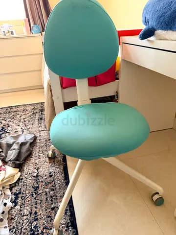 Light teal adjustable study/desk chair in good condition