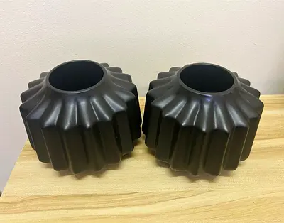 Pair of black decorative vases