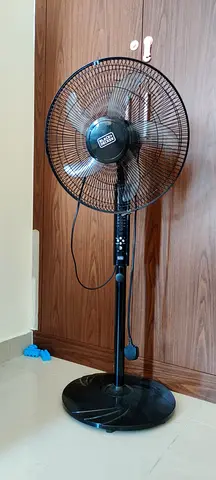 Black pedestal standing fan with remote - working condition