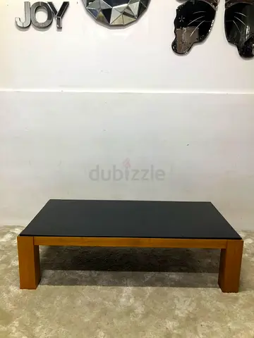 Coffee table with black glass