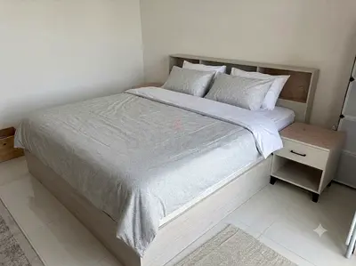 King size bed frame 180cm with matching bedside table and Mattress Perfect condition - light wood