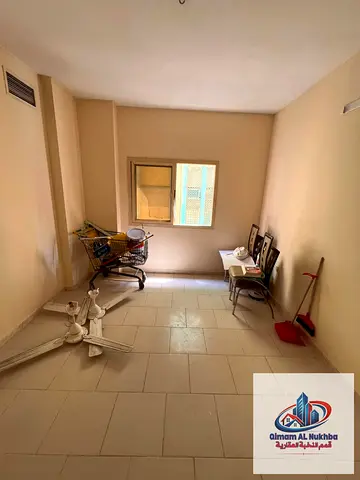 غرفة وصالة للإيجار في البوطينة | تكييف مركزي وغاز مركزي | مع موزع | سعر مميز 24,000 درهم سنوياً | 4 دفعات | التأمين شيك.