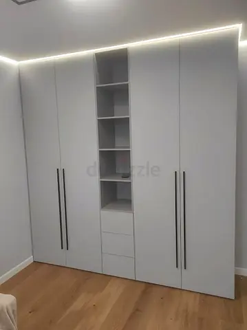 Built-in white wardrobe with open shelves and drawers - excellent condition