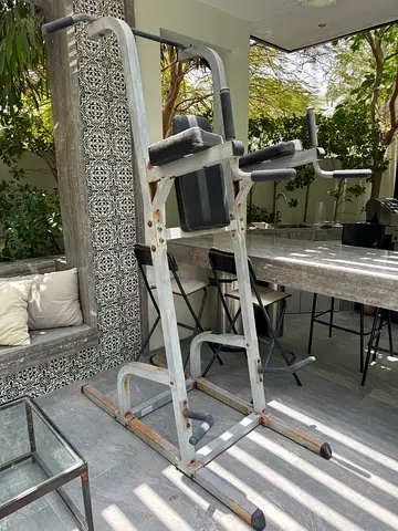 Used home multi-gym station — metal frame, functional condition