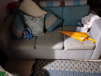 Three-seater fabric sofa in light blue - good condition