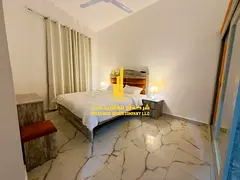 Luxury apartment, second occupancy, one bedroom and living room with a balcony and open view. Ajman,