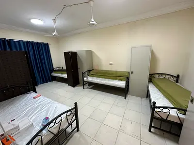 Executive Bedspace for Gents with divider partition, opp.Nesto Mia Mall,Facing Sahara,Al nahda shaj