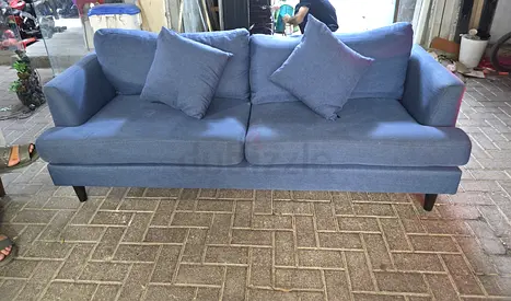 Blue 3.+2-seater fabric sofa in good condition