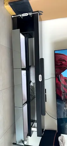 Black modern TV entertainment unit with mirrored drawers