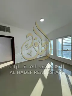 Spacious 3BR + Hall in Al Qasba: Stunning Views, Master Bedroom, Large Balcony & Free Parking