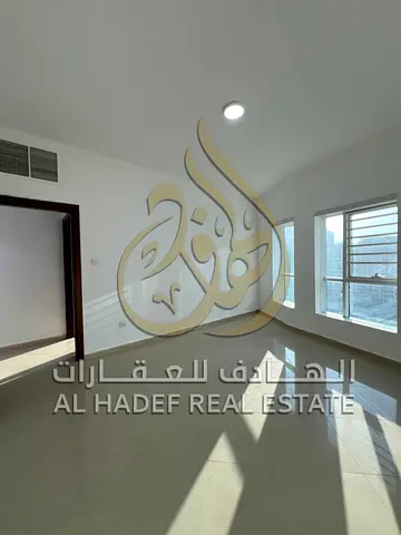 Spacious 3BR + Hall in Al Qasba: Stunning Views, Master Bedroom, Large Balcony & Free Parking