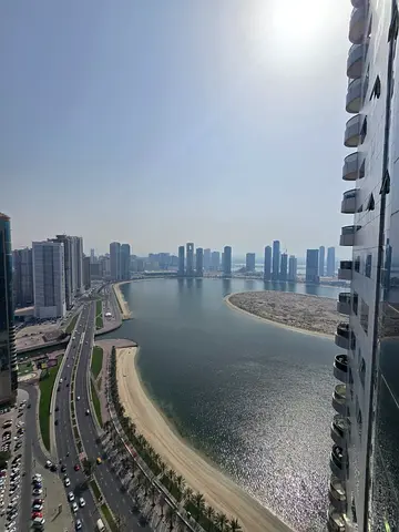 3-bedroom apartment with a living room available for annual rent in Al Khan (Al Shahd Tower). Includes a maid's room, gym, swimming pool, and free par