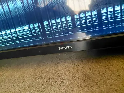 Philips 65-inch LED TV (screen damaged) - for parts or repair - Brand: Philips