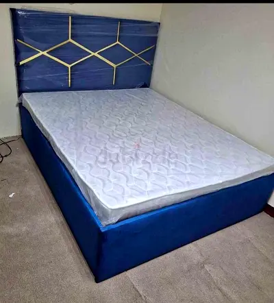 Modern Blue Velvet Bed Frame with Geometric Gold Detail Headboard