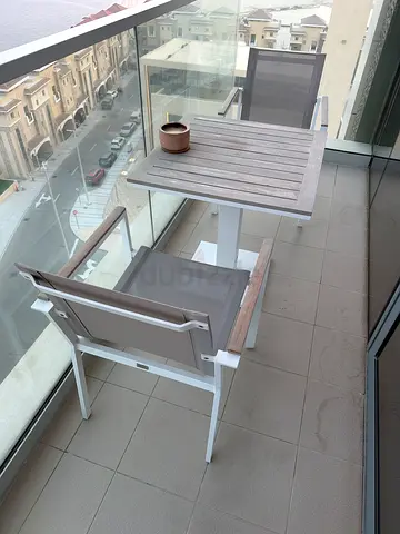 Outdoor balcony dining set — wooden table with two  chairs