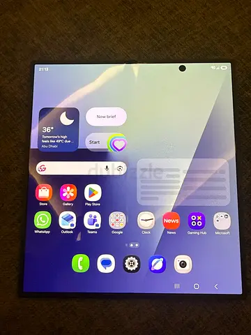 Phone with circular triple camera — used, good condition