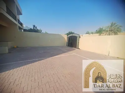 A two-story villa for annual rent in Al Shahba area, Sharjah, with a total area of 6,500 sq ft. It features 5 bedrooms (including 2 master bedrooms)