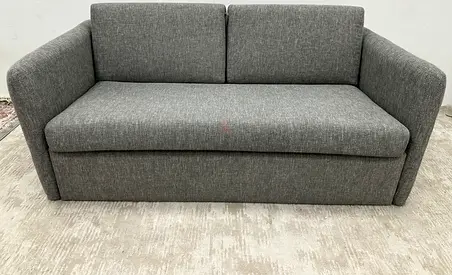 Like new condition marina home two seater sofa bed