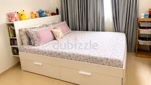 IKEA bed with 4 drawers and back head for sale