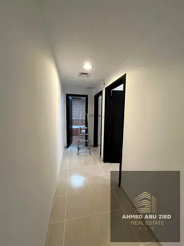 Two bedrooms and a living room for annual rent on Al Ittihad Street in Ajman, next to Emirates Markets, with a balcony, two bathrooms, spacious areas,