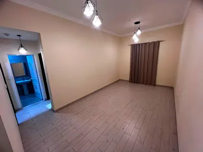 Spacious 1BR apartment in Al Jurf 3, near China Mall, central AC, easy access to Dubai.