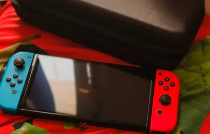 Nintendo Switch OLED Neon Blue/Red - Boxed