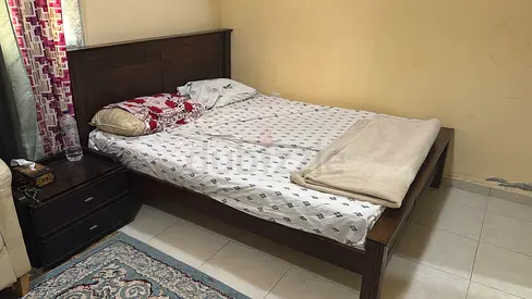 Give away price Solid wood double bed with almost new mattress good condition