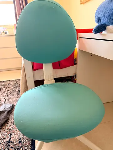 Light teal adjustable study/desk chair in good condition