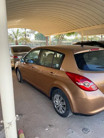 Coz of final departure….Nissan Tiida 2009 SE | GCC Specs | Well Maintained ( SHARJAH PLATES NUMBER)