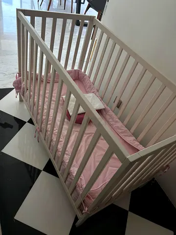 White Wooden Baby Crib with Pink Bedding - Good Condition