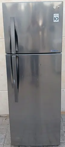 This Brand LG Refrigerator, capacity liters 392, color is silver, condition is perfectly working