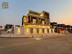 Luxury standalone villa for sale in Al Helio, Ajman. Includes registration fees, electricity, and wa
