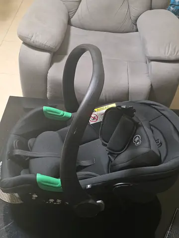 Infant car seat carrier (rear-facing) - good condition ,brand new, not used at all. Kinderkraft .