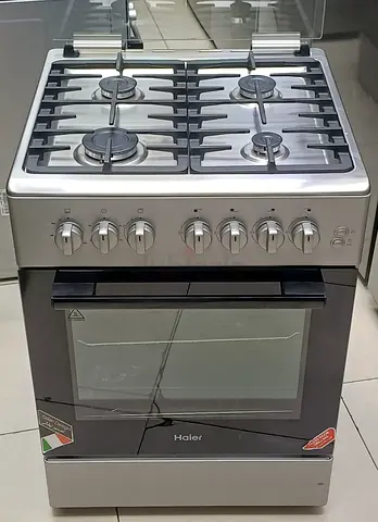 Haier 4-Burner Gas Cooker with Oven - Stainless Steel, Good Condition