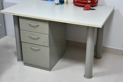 Solid wood table with metal drawers