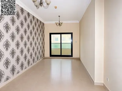 **One-Bedroom Apartment for Sale in Emirates City with Parking**