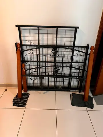 Queen metal bed frame with wooden posts — good condition