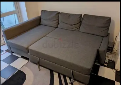 Grey L-shaped Sofa Bed with Storage - Good Condition
