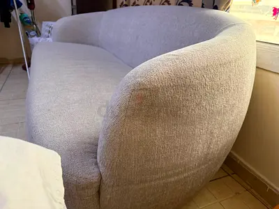Curved 3-Seater Beige Fabric Sofa - Good Condition